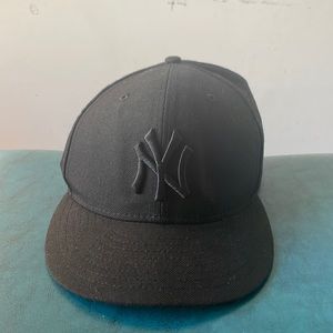 New Era Fitted black on black Yankee hat.